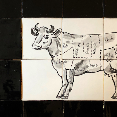 Cow at the butcher's tile panel